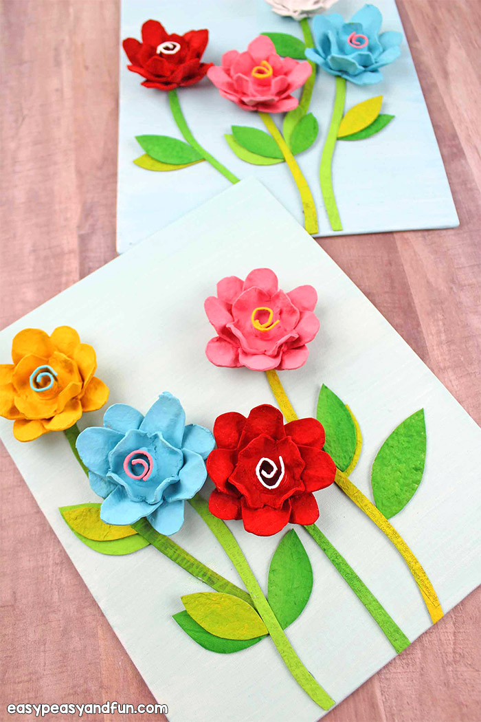 Egg Carton Flowers - Simple and beautiful egg cartoon crafts for kids. We love recycled crafts, and these Egg Carton Flowers are the perfect example. The perfect spring craft for kids, and an even better craft for Mother's Day.