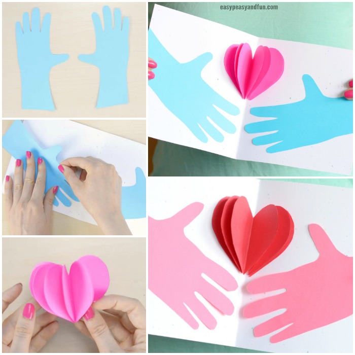 Hand holding a heart mother's day children's card craft