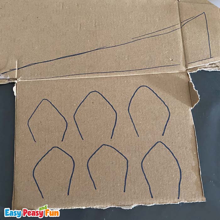 Cardboard with outlines drawn on it