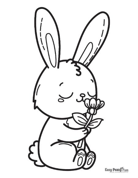 Bunny holding a flower to color.