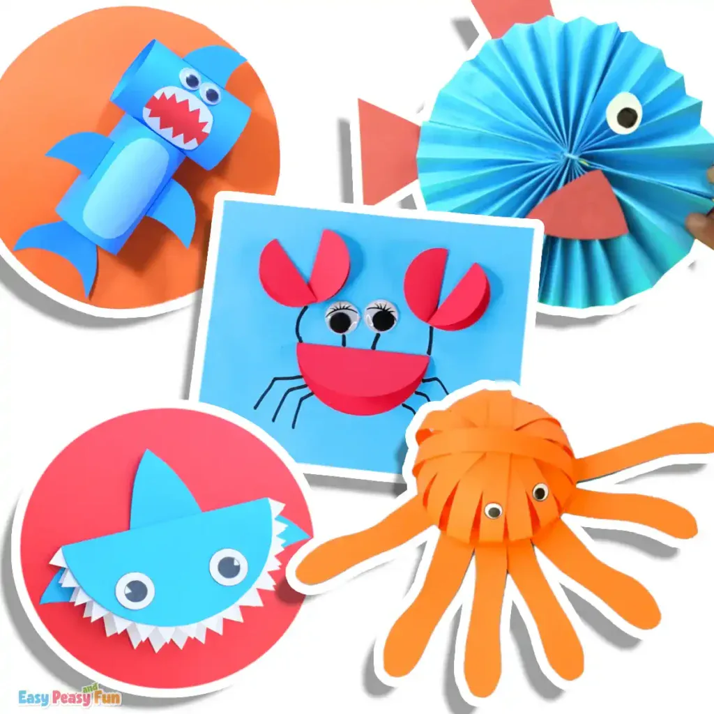 A collage of colorful construction paper ocean animal crafts, featuring an octopus with long paper strips, two sharks, a crab, a fish, and a whale.
