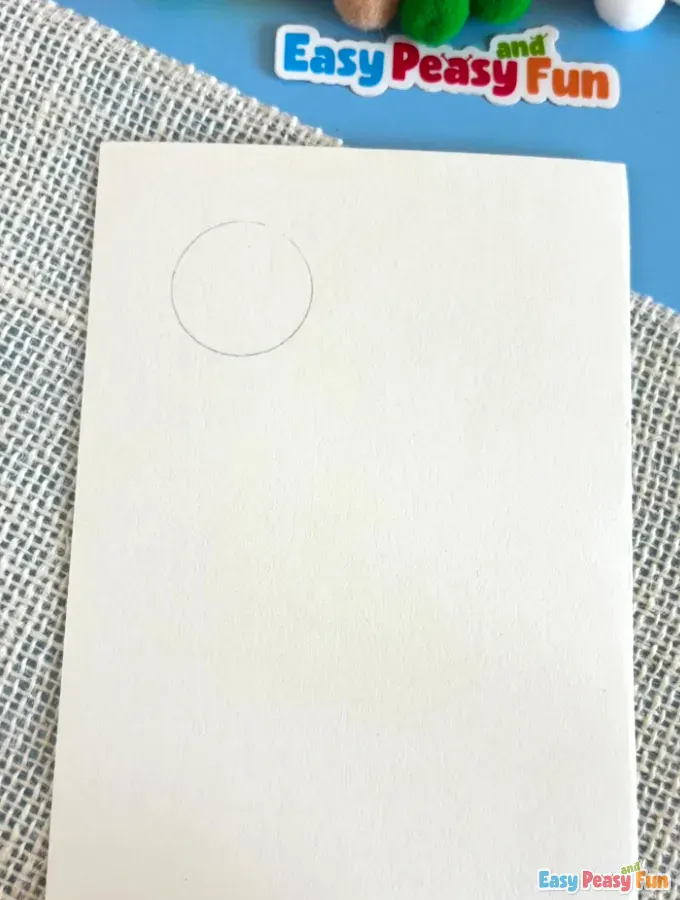Traced circle in the top left position on a white cardstock.