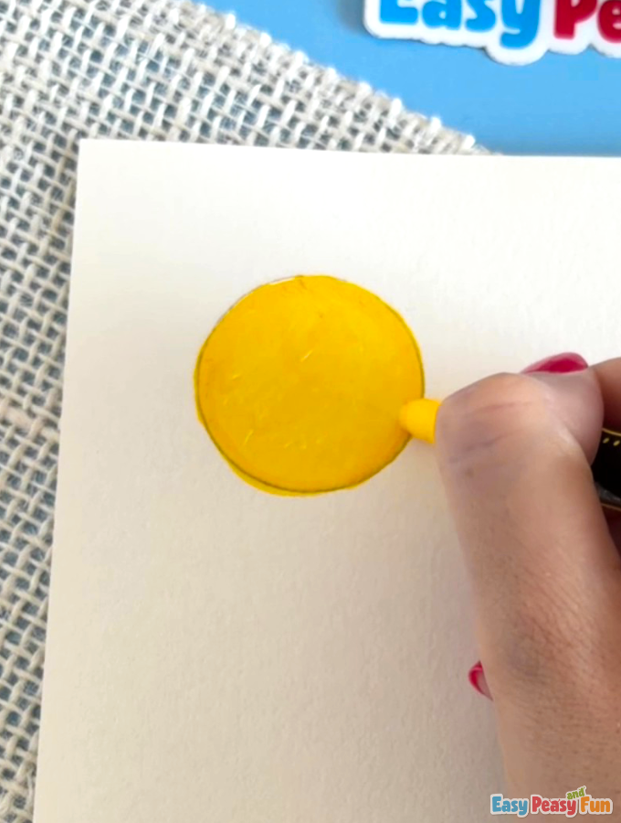 Yellow marker filling in the center of the drawn circle.
