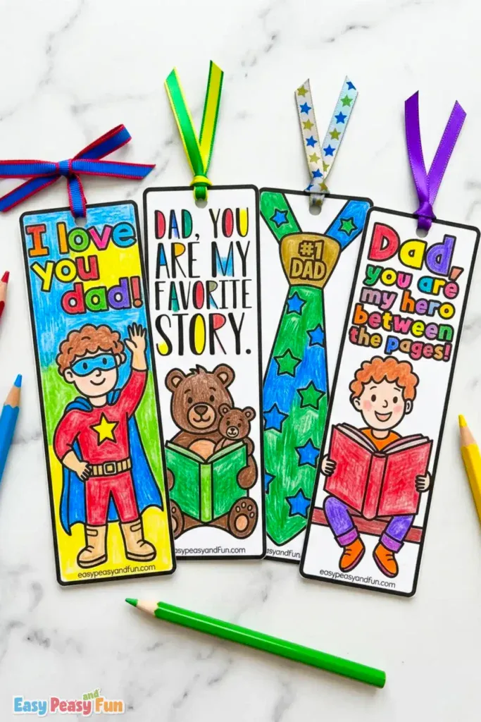 Four colored Father's Day bookmarks featuring a superhero kid "I Love You Dad", bear and cub reading "Dad You Are My Favorite Story", a starry #1 Dad tie, and a bookworm kid "Dad You Are My Hero Between The Pages".