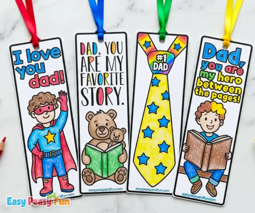 Four colored Father's Day bookmarks with ribbons featuring a superhero kid "I Love You Dad", bear and cub reading "Dad You Are My Favorite Story", a starry #1 Dad tie, and a bookworm kid "Dad You Are My Hero Between The Pages".