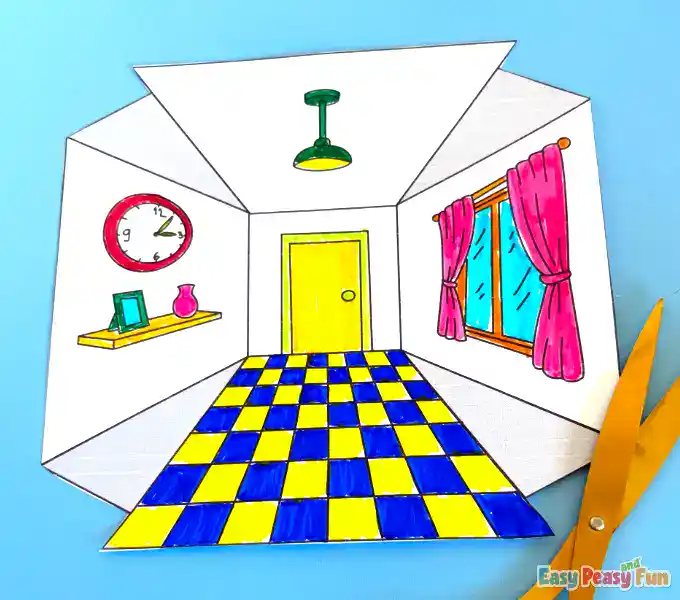 Carefully using scissors to trim along the solid lines of the paper.