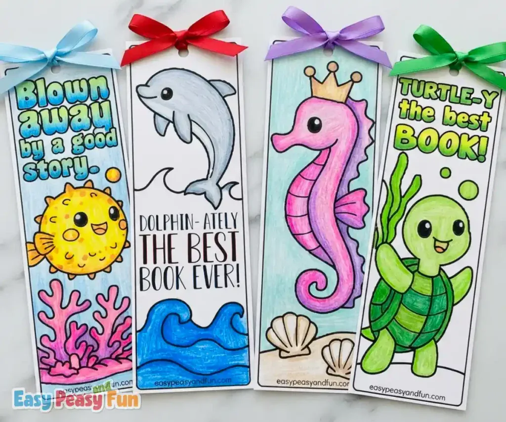 Four colored bookmarks featuring a pufferfish, dolphin, seahorse, and turtle with ribbon tops.