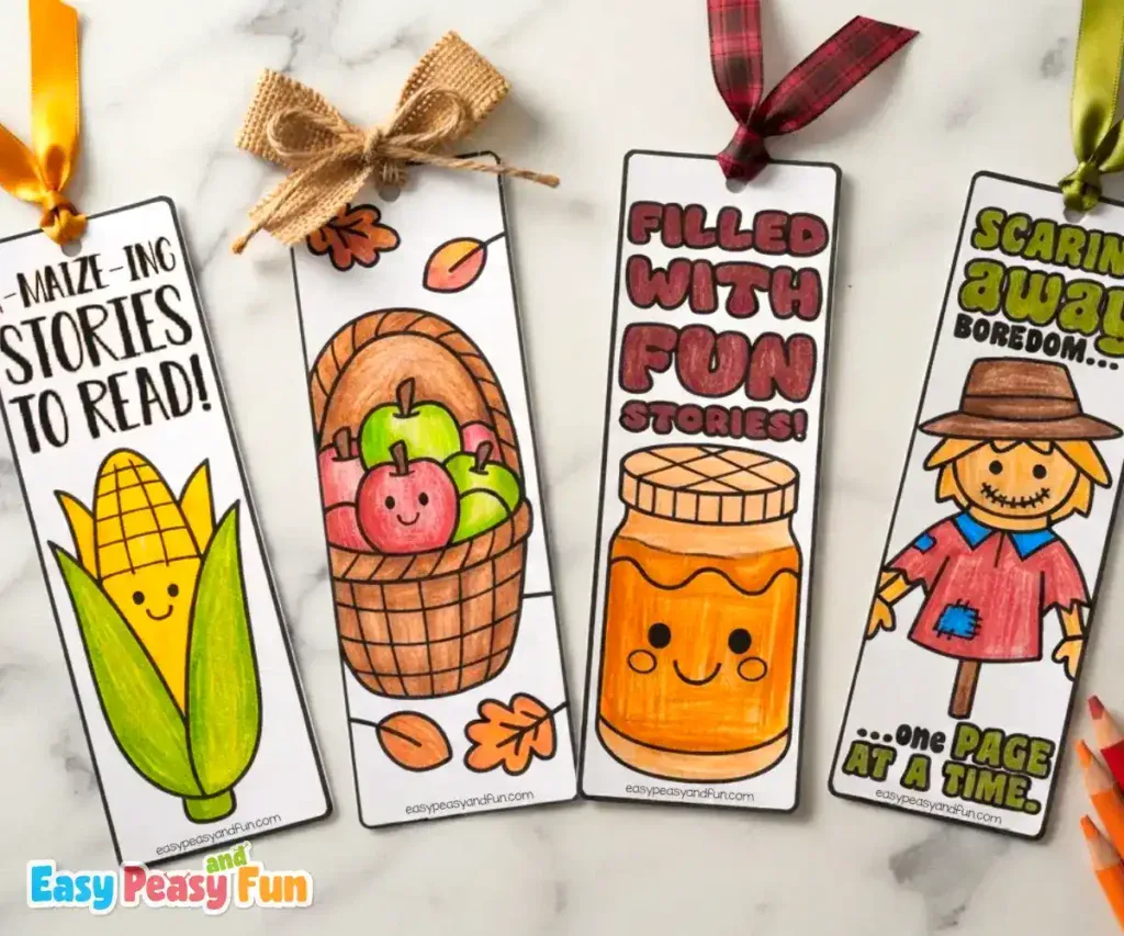 Four colored bookmarks featuring a corn cob, an apple basket, a jam jar, and a scarecrow.