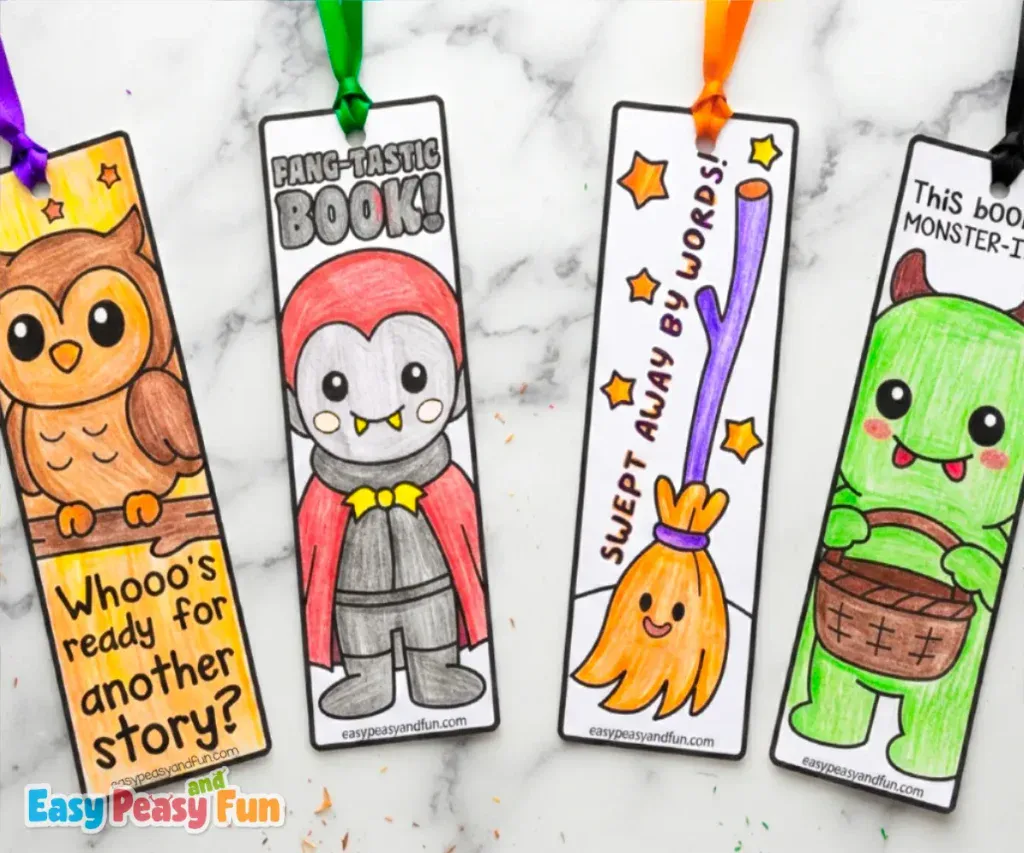 Four colored Halloween bookmarks featuring an owl, a vampire, a broomstick, and a monster.