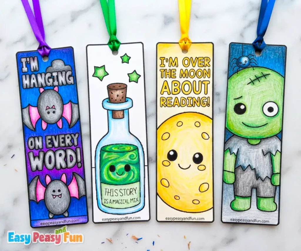 Four colored Halloween bookmarks featuring bats, a potion bottle, a full moon, and a zombie.