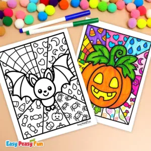 Two Halloween coloring pages, one uncolored bat design and one brightly colored pumpkin design, surrounded by markers and colorful pompoms on a table.
