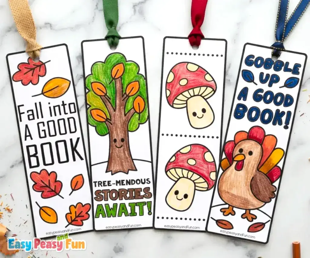 Four colored bookmarks featuring scattered leaves, a smiling tree, mushrooms, and a turkey.