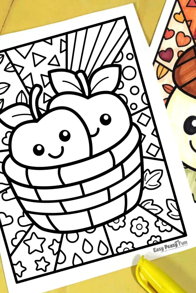 Two smiling apples sitting inside a woven basket on a patterned pop art coloring page, with a corner of another colored acorn page visible on the right.