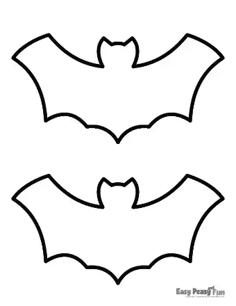 Printable template displaying two large flying bat outlines with expansive wings and a simple, curved head shape.