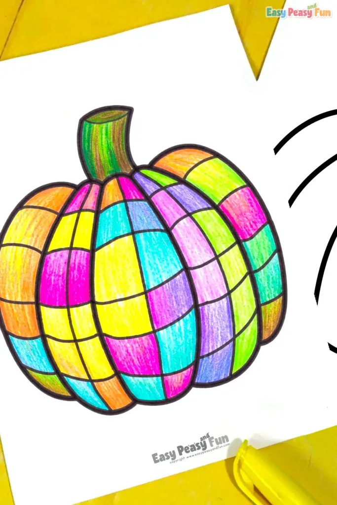 A close-up of a rainbow-colored grid pattern pumpkin sheet.