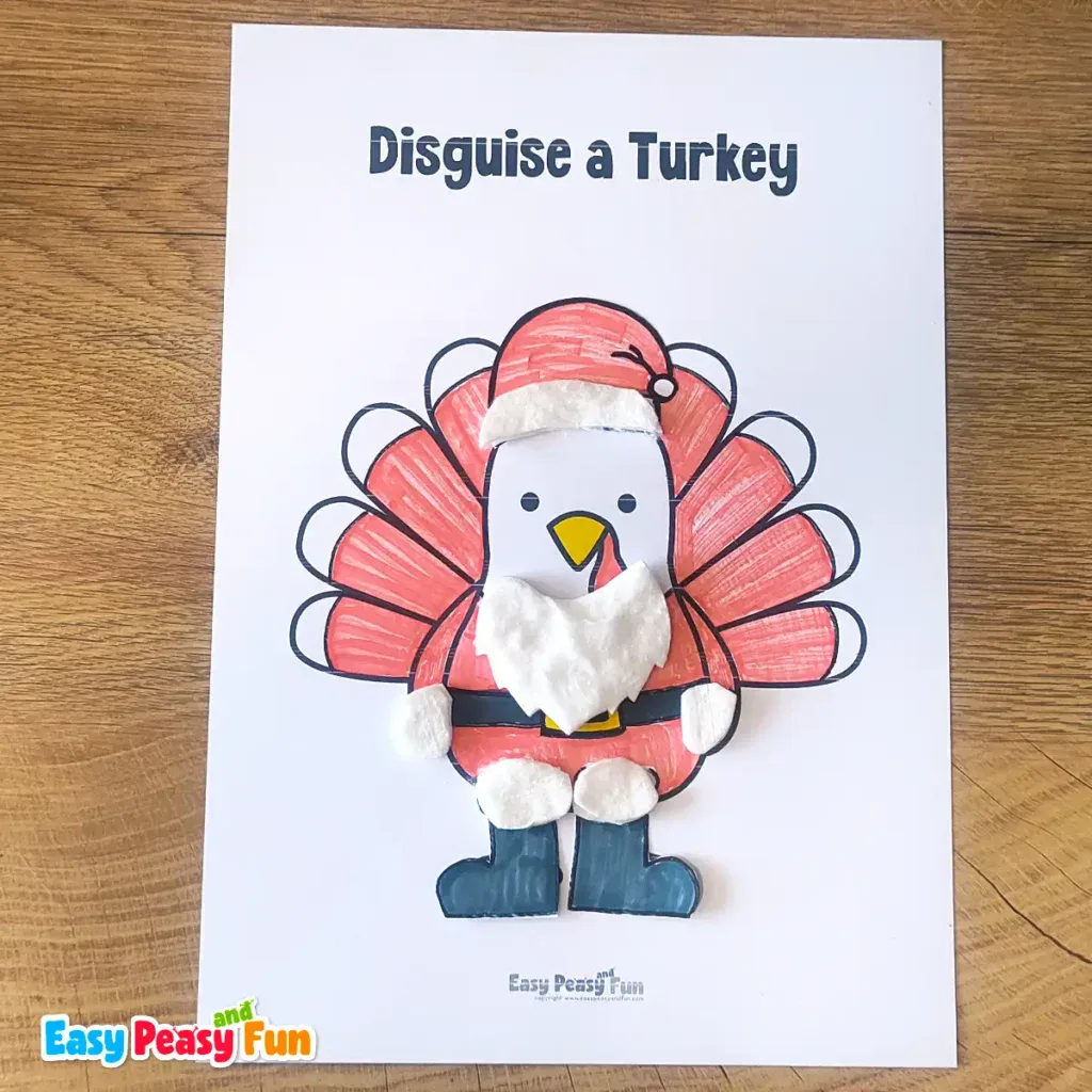 A paper turkey craft template disguised as Santa Claus with a red hat, white cotton beard, and black boots.