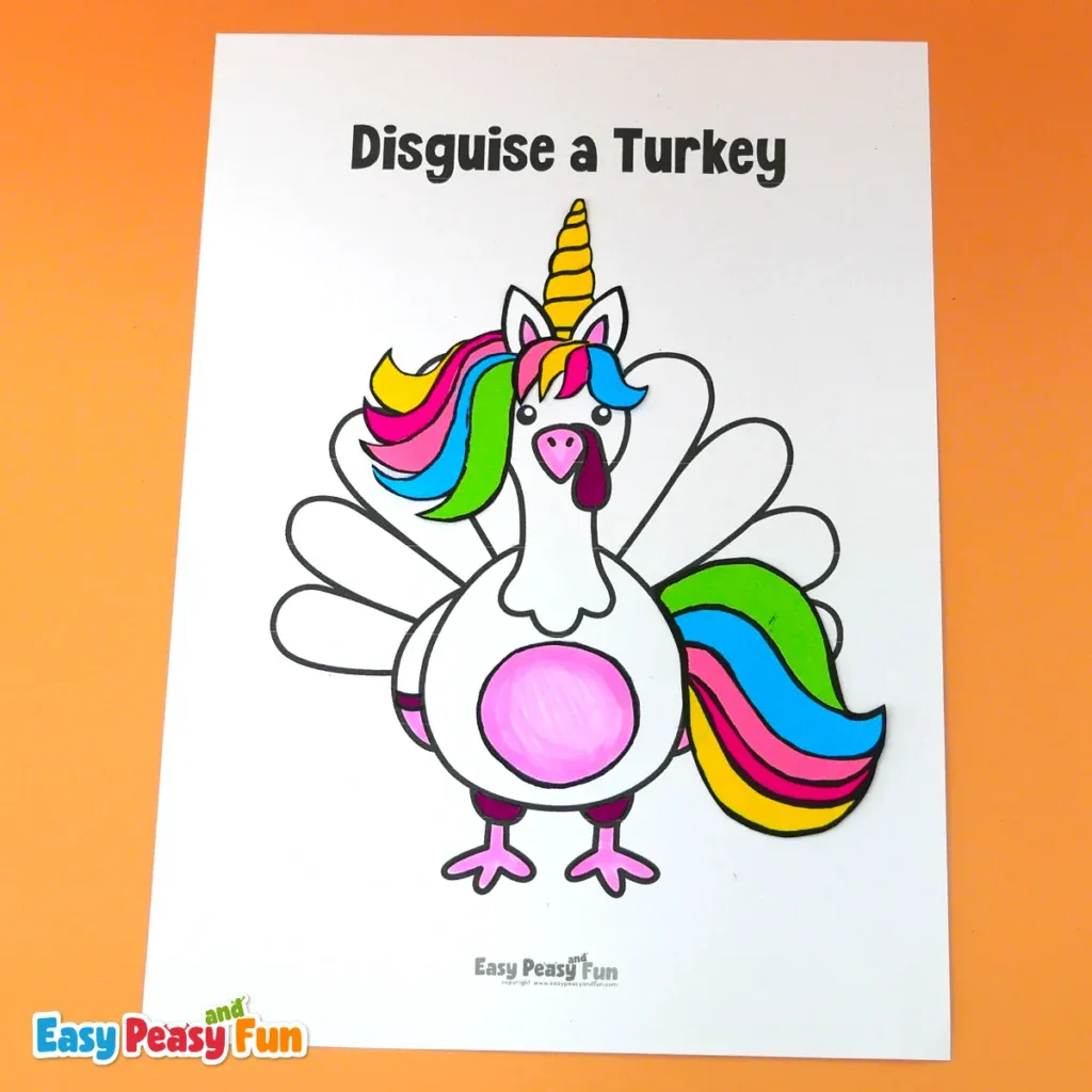 A paper turkey craft disguised as a unicorn, featuring a yellow horn and a colorful rainbow-striped mane and tail.