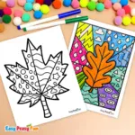 Two printed leaf coloring pages and markers arranged on a light surface.