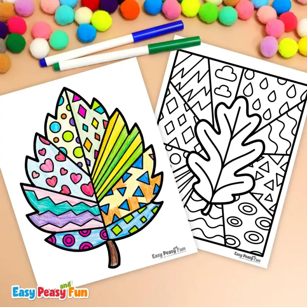 Two printed leaf pop art coloring pages arranged with markers and craft supplies.