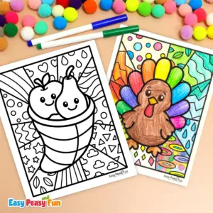 A cornucopia page and a colored turkey page surrounded by colorful pom-poms and markers.